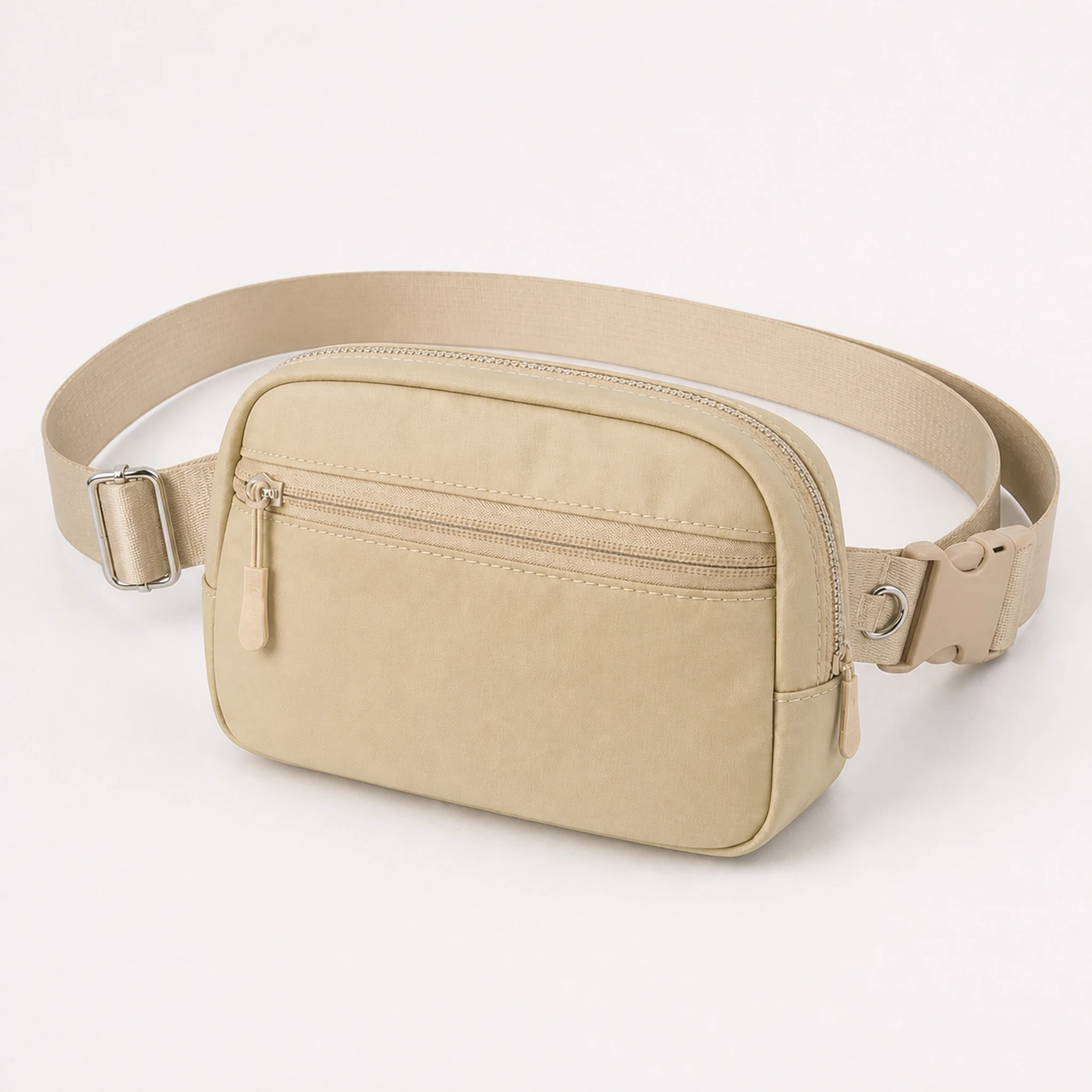 Beige dog walking crossbody bag with a complete shoulder strap on a warm white background